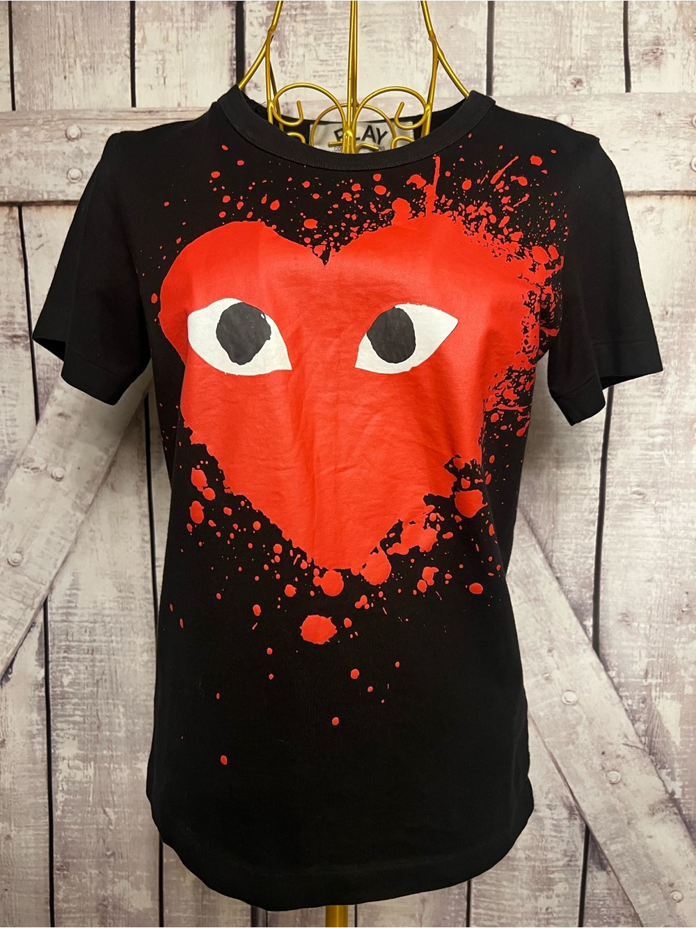 Black Short-Sleeve Tee with Red Heart Eye Graphic